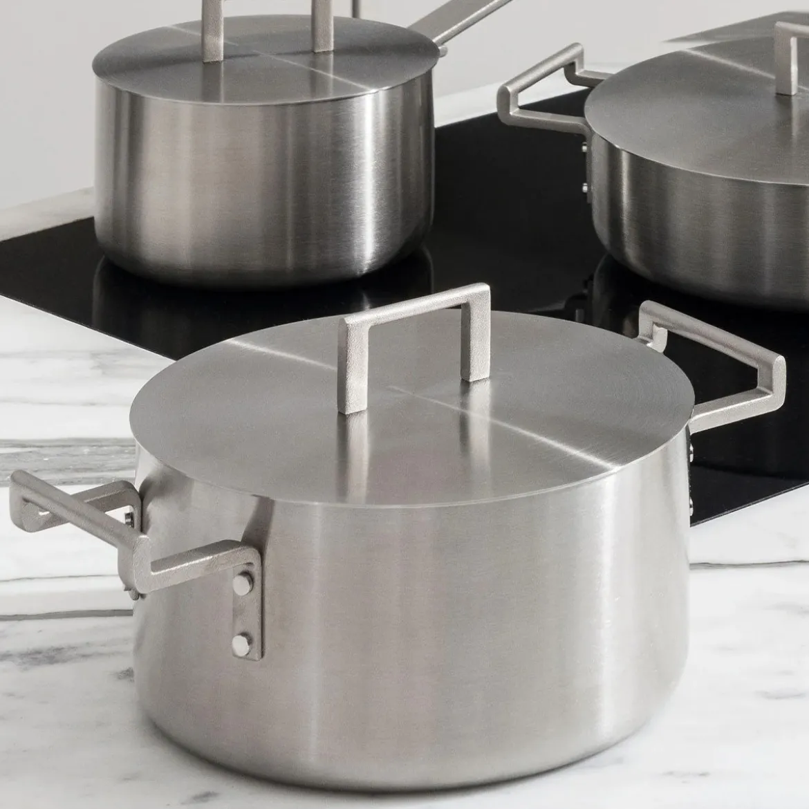 Batería de cocina de acero inoxidable multicapa Convivio Alessi