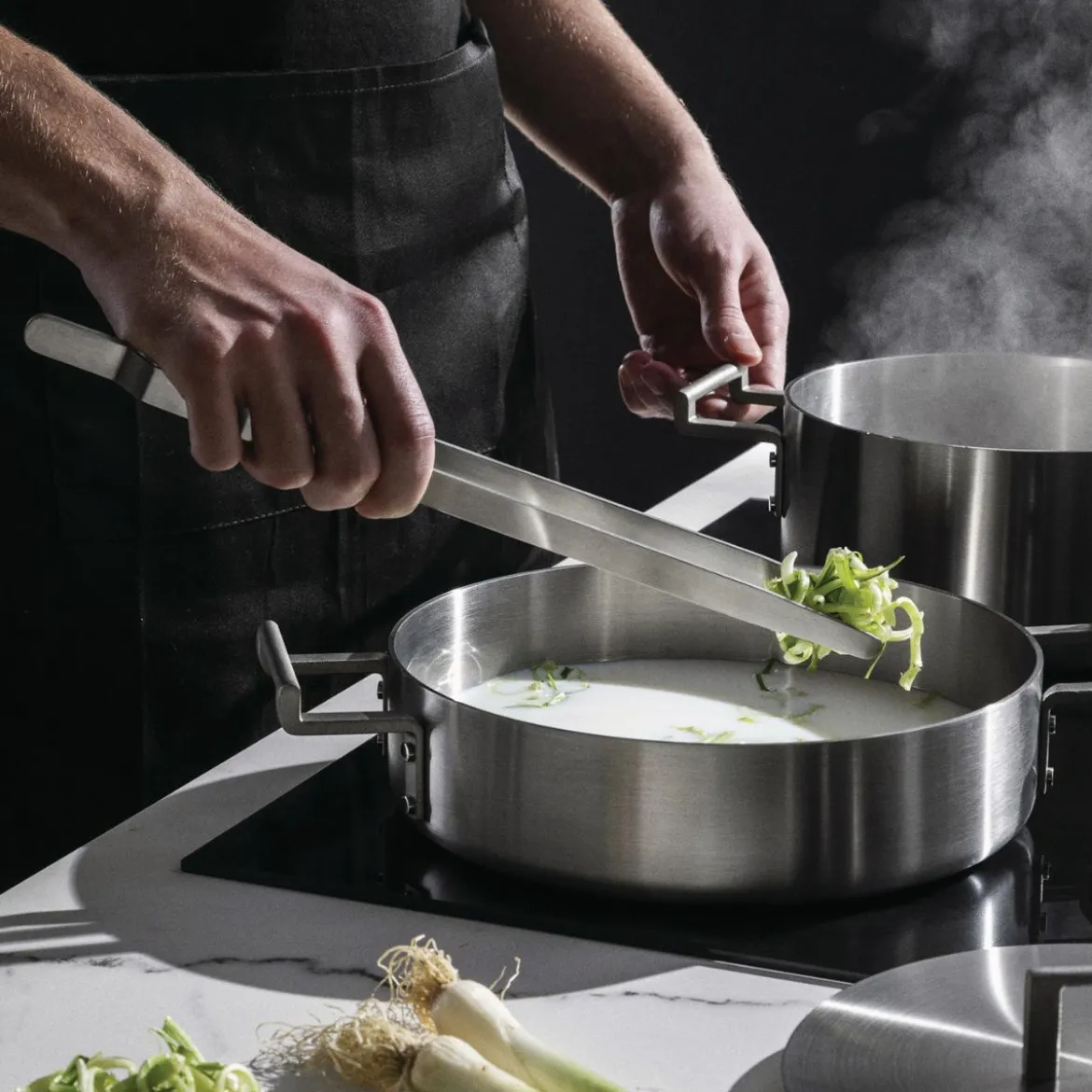 Batería de cocina de acero inoxidable multicapa Convivio Alessi