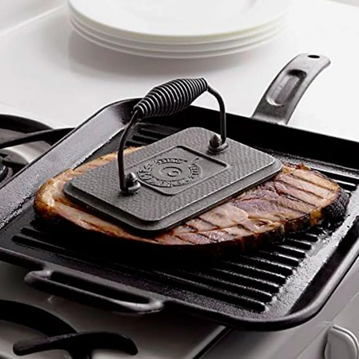 Prensa de parrilla de hierro rectangular Lodge