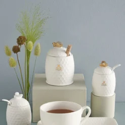Tarro de porcelana para la miel con cuchara de madera Aperegina Oro La Porcellana Bianca